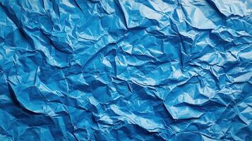 Crumpled blue paper background photo