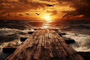 A wooden dock with birds flying over it at sunset photo