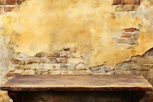 An old table sitting in front of a brick wall photo