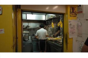 A busy kitchen with chefs preparing food. photo