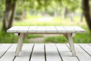 A rustic wooden table in a serene outdoor setting. photo