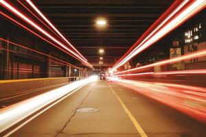 A dynamic long-exposure shot of traffic under a bridge. photo
