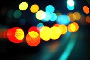Blurry night traffic lights creating a colorful bokeh effect. photo