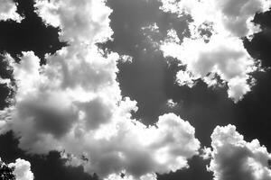 Black and white clouds against a dramatic sky. photo