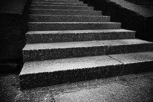 Black and white image of stone steps. photo