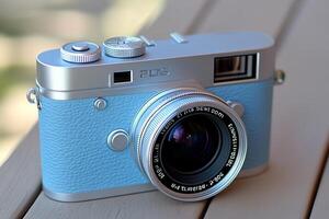 A stylish vintage camera with a blue textured body. photo