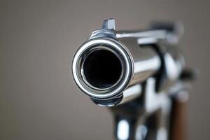 Close-up view of a gun barrel. photo