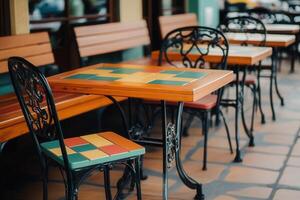 Colorful tables and chairs in a restaurant photo