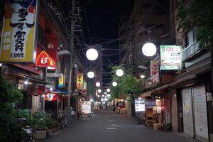 Nighttime street scene with lanterns and shops. photo