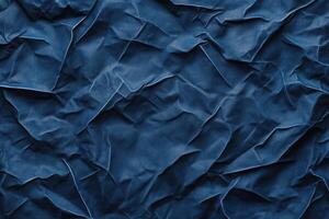 Crumpled navy blue texture background for design use. photo