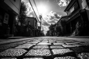 Cobblestone street under a dramatic sky in black and white. photo