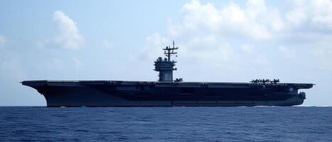 Aircraft carrier sailing ocean, cloudy sky photo