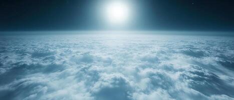 Aerial view Sunlit cloudscape, high altitude, nighttime sky photo