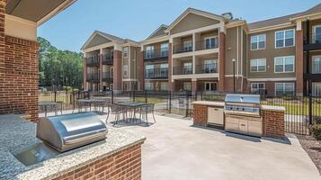 Apartment complex grilling patio, summer photo