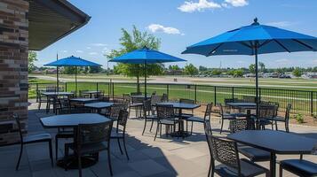 Outdoor patio cafe tables sunny day photo