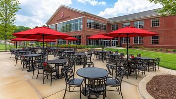 Outdoor patio tables, campus setting, sunny day photo