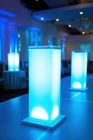 Blue light columns in a banquet hall photo