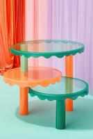 Colorful tiered tables with glass tops and scalloped edges photo