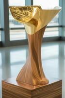 Gold and wood abstract sculpture photo
