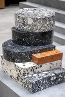 Stacked, geometric forms of recycled materials photo
