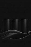 Three black containers on a black background photo