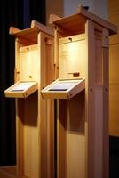 Two wooden display stands photo