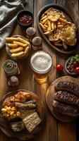 A Rustic Feast of Grilled Meats, Fries, and Beer photo
