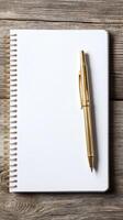 Blank Spiral Notebook with Gold Pen - Ready for Ideas and Planning photo
