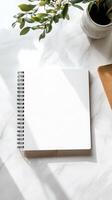 Blank Notebook on Marble Surface - Minimalist Aesthetic photo