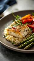 Pan-Seared Fish with Risotto and Asparagus - Exquisite Culinary Delight photo