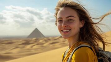 Smiling Woman in Egyptian Desert, Pyramid Background photo