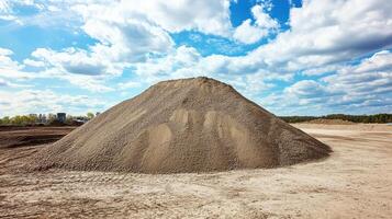 Massive Sand Pile Under Sunny Sky - Construction Material photo