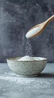 Sugar Pouring into a Bowl - Sweet Treat photo