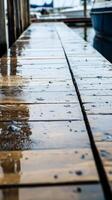 Wet Wooden Dock at the Waterfront with Reflections photo