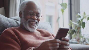 Senior Man Engaging with Mobile Device, Happy and Connected photo