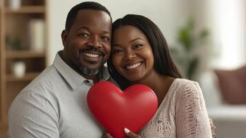 Couple holding heart, expressing love and affection photo