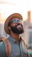 Smiling Man with a Backpack and Hat photo