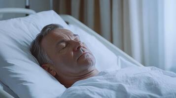 Hospitalized Man Sleeping in Bed - Peaceful Moment of Rest photo