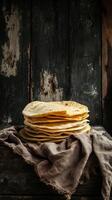 Stacked Tortillas on Rustic Wooden Table photo