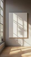 Empty Frame in a Modern Interior with Sunlight and Shadow photo