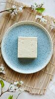 A Pristine Block of Tofu, Ready for Culinary Delights photo