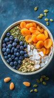 Healthy and Delicious Breakfast Bowl with Berries, Apricots, and Seeds photo
