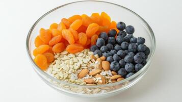 Nutritious Breakfast Bowl with Dried Apricots, Blueberries, Almonds, and Oats photo
