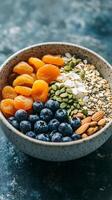 Nutritious Breakfast Bowl with Dried Apricots, Blueberries, and Almonds photo