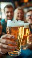 Friends Raising a Toast with Cold Beer photo