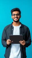 Smiling Man Holding Tablet - Positive and Confident photo