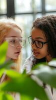 Two Young Scientists Collaborate on a Botanical Experiment photo