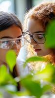 Two Young Scientists Investigating Plant Growth photo