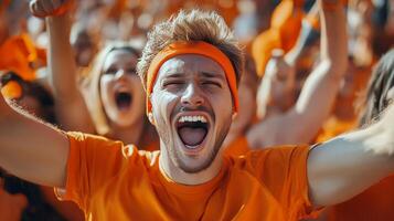 Crowd of Excited Fans Celebrating a Sporting Event photo
