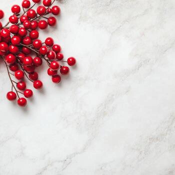 Red berries on textured white surface photo